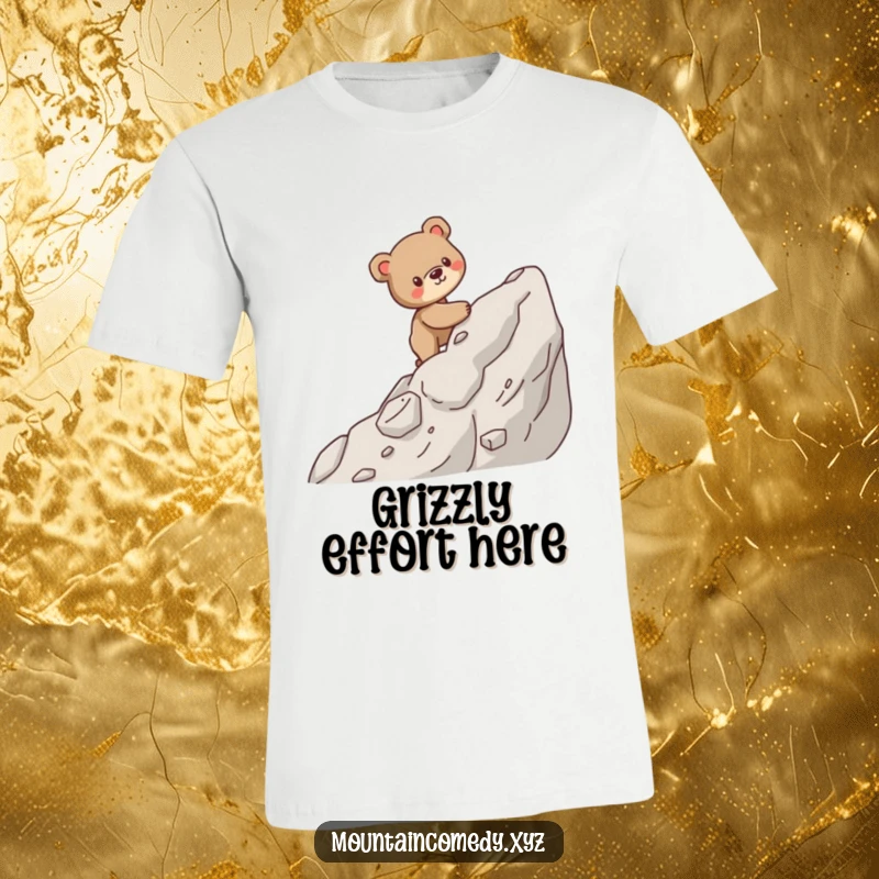 Funny t-shirt depicting a sturdy bear cub navigating a steep, rocky mountain path with focus and determination.