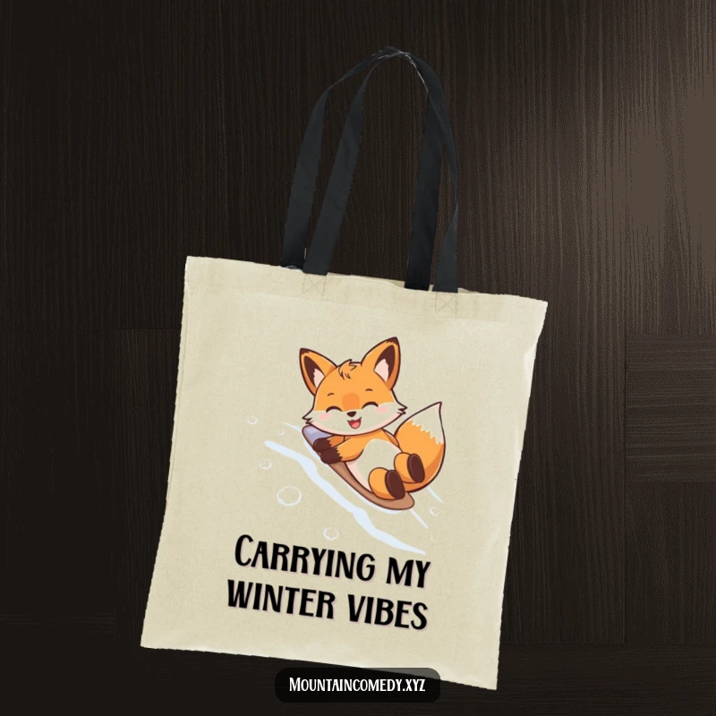 Funny tote bag with a playful fox character belly sliding down a snowy slope, perfect for carrying groceries with a smile.
